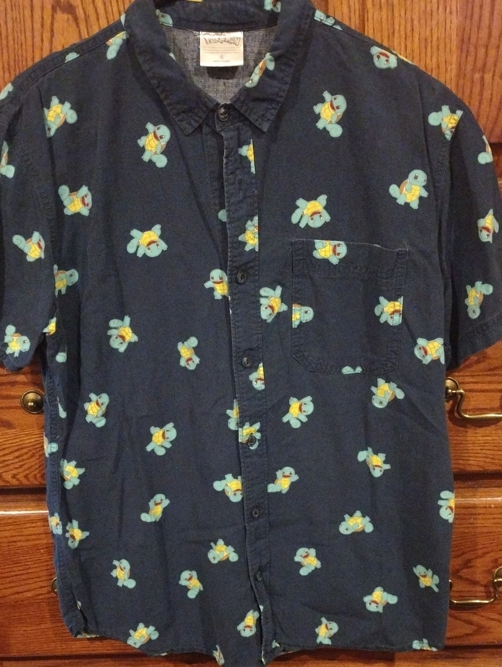 Pokemon Squirtle Mens Small Navy Blue Short Sleeve Button Up Shirt.